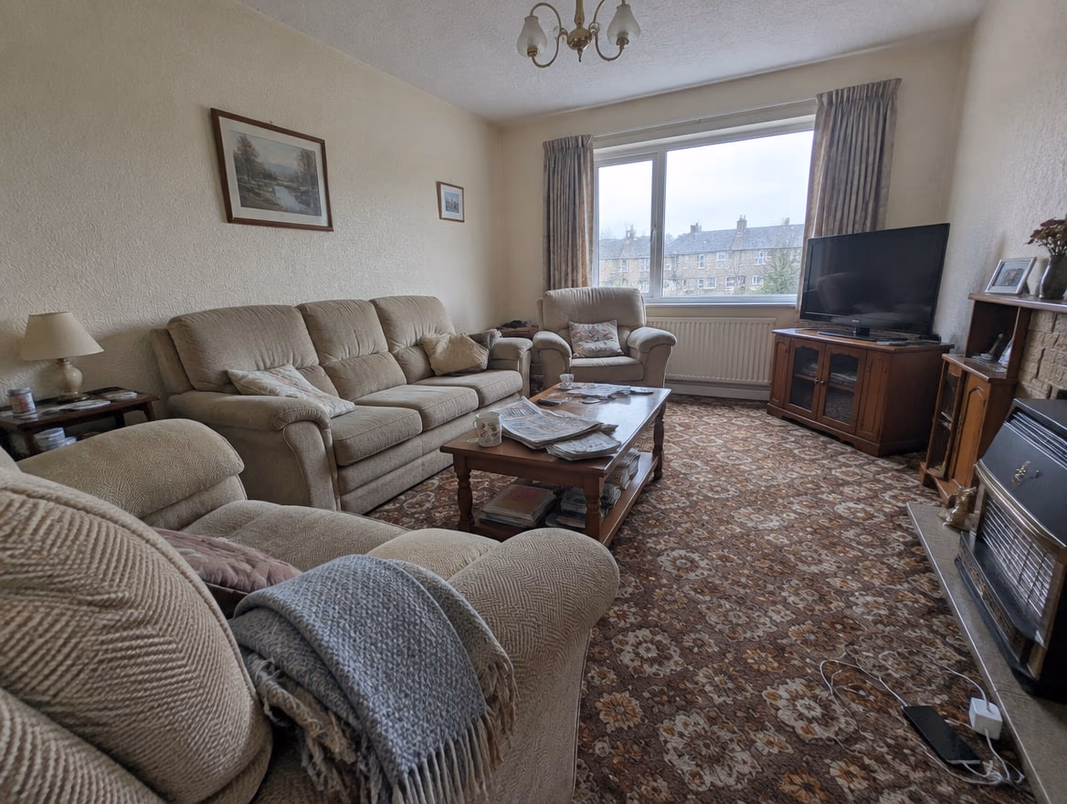 An ordinary room photographed on a phone before any redesign
