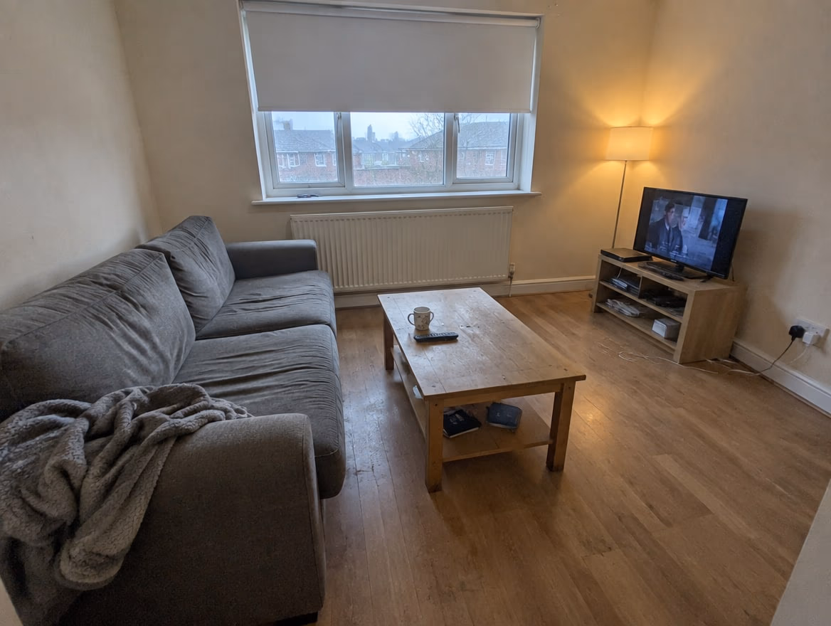 An ordinary room photographed on a phone before any redesign