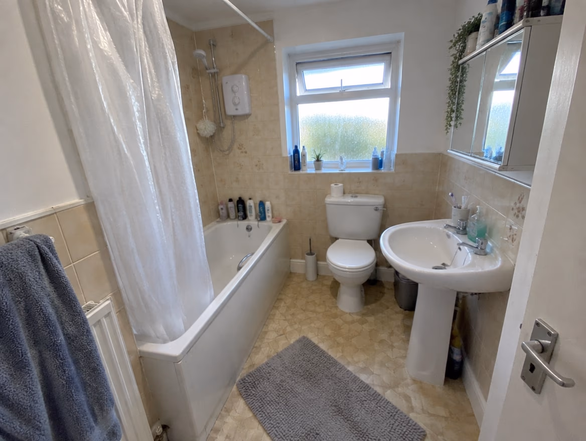 An ordinary room photographed on a phone before any redesign